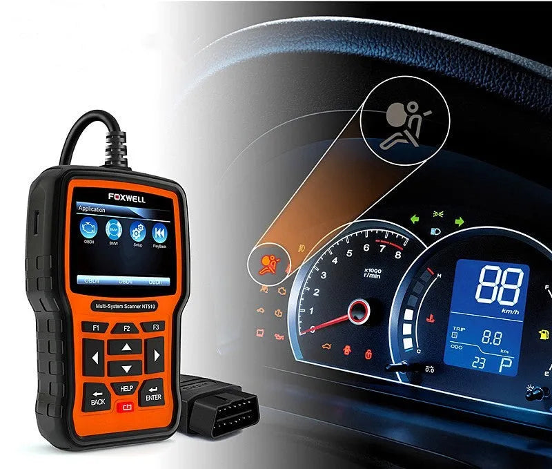 Foxwell NT510 orange and black automotive OBD2 diagnostic scanner with data cable.