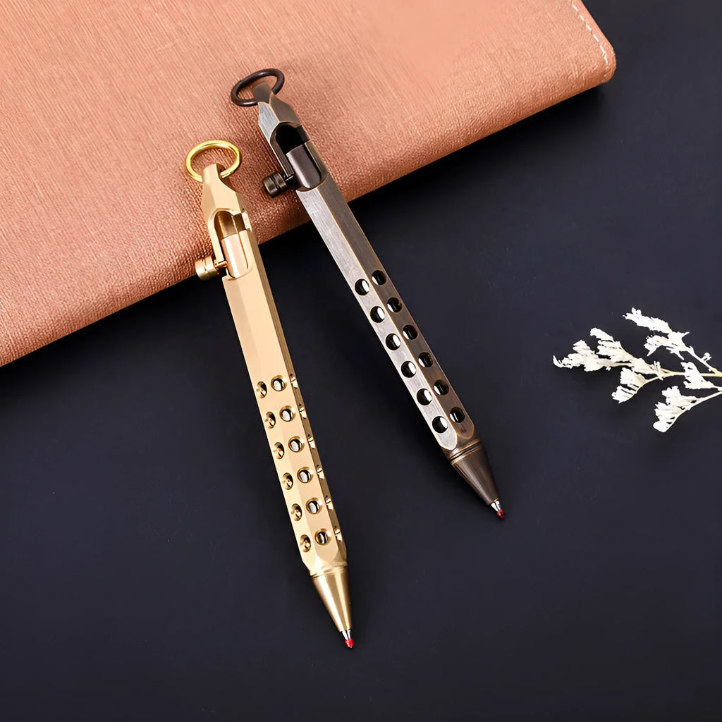 Brass hexagonal bolt action rollerball pen showing six-angle barrel and bolt mechanism