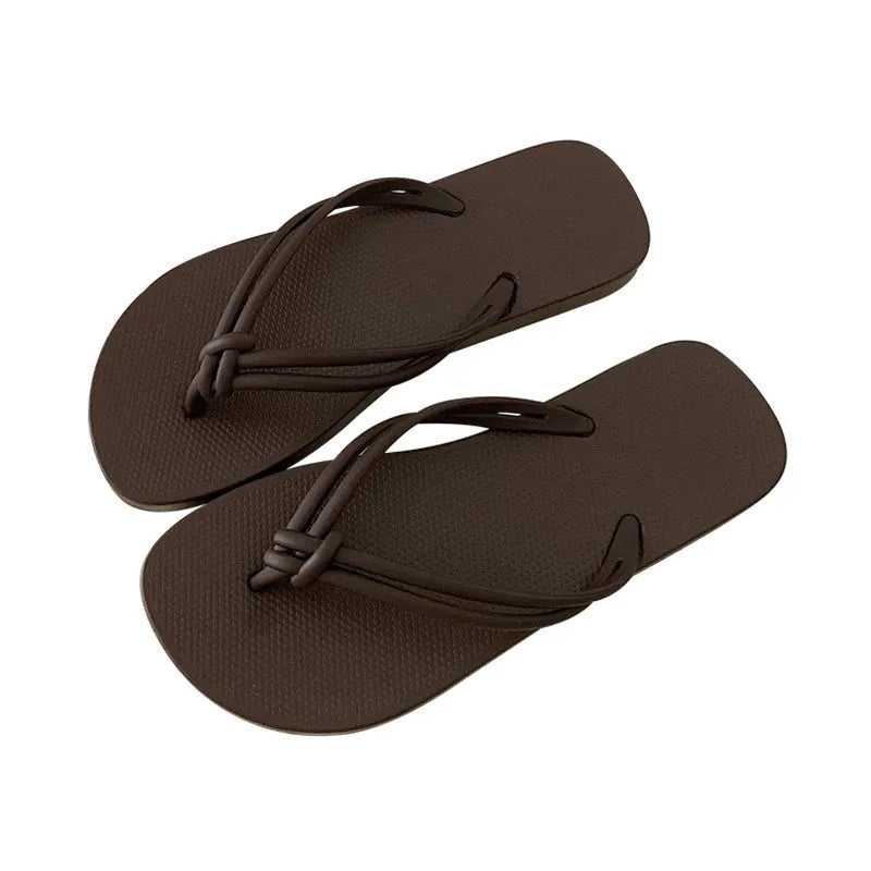 PVC casual flip flops with toe-covering design and injection moulded non-slip soles