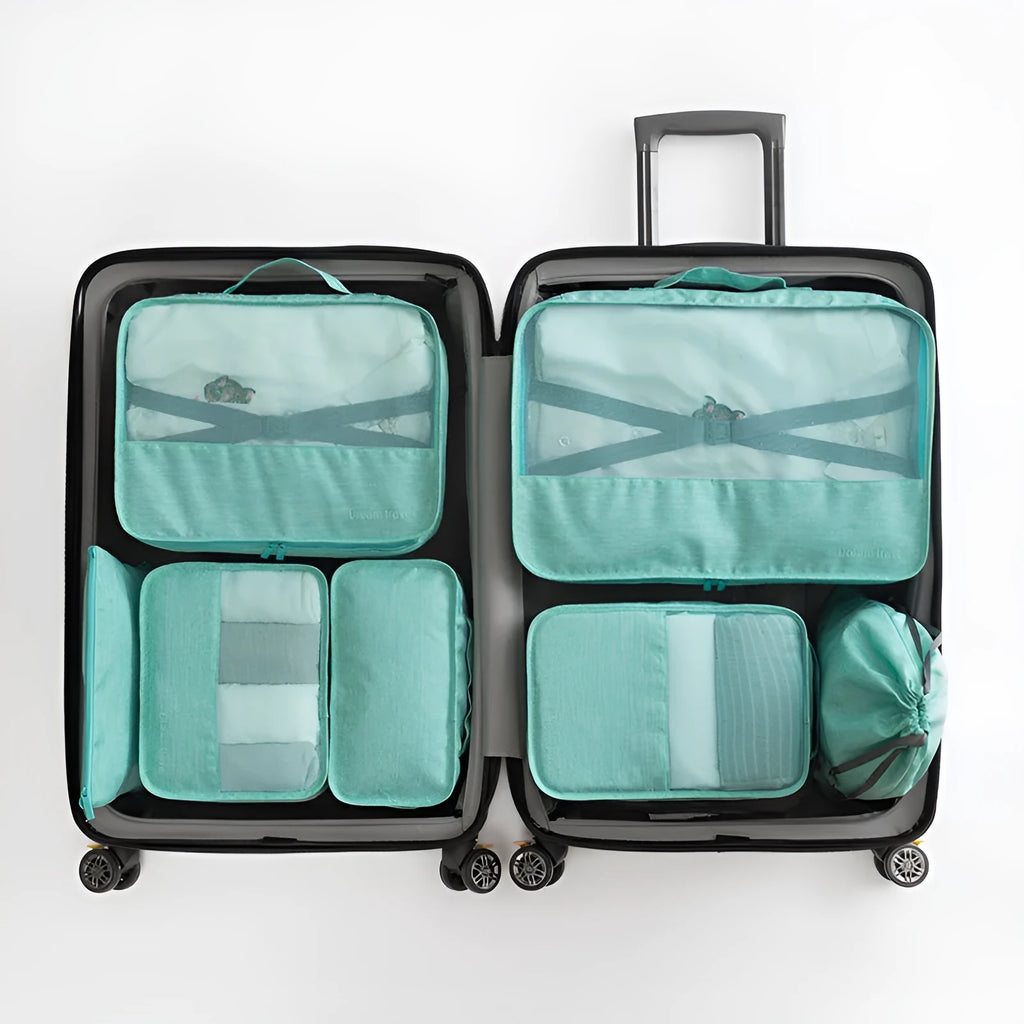 Set of 7 waterproof nylon travel tote bags in black, gray, dark blue, blue, and orange showing different sizes