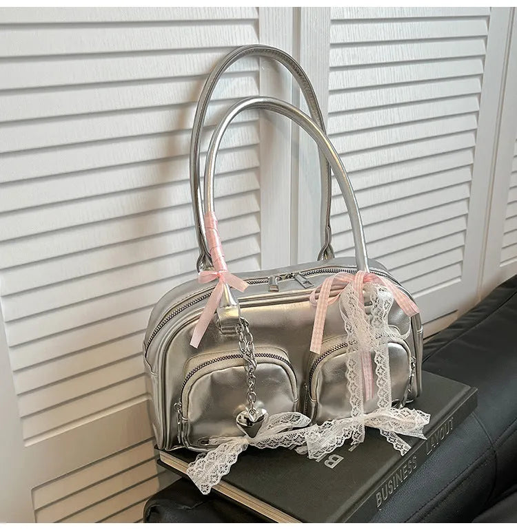 Beige PU shoulder bag with double straps and phone compartment showing structured square shape