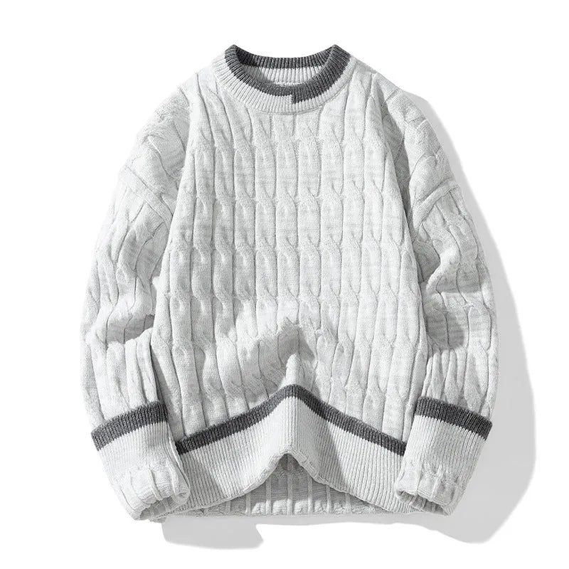 Man wearing a two-piece loose fit sweater in a sports style, showing the acrylic and modal fabric texture.