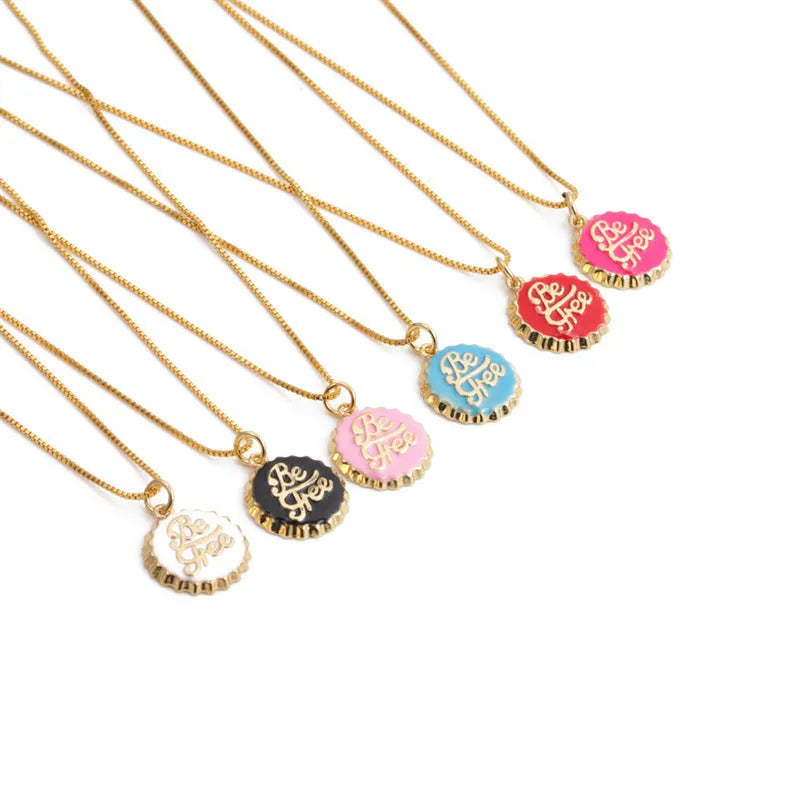 Gold electroplated copper bottle cap pendant on a 40cm box chain necklace.
