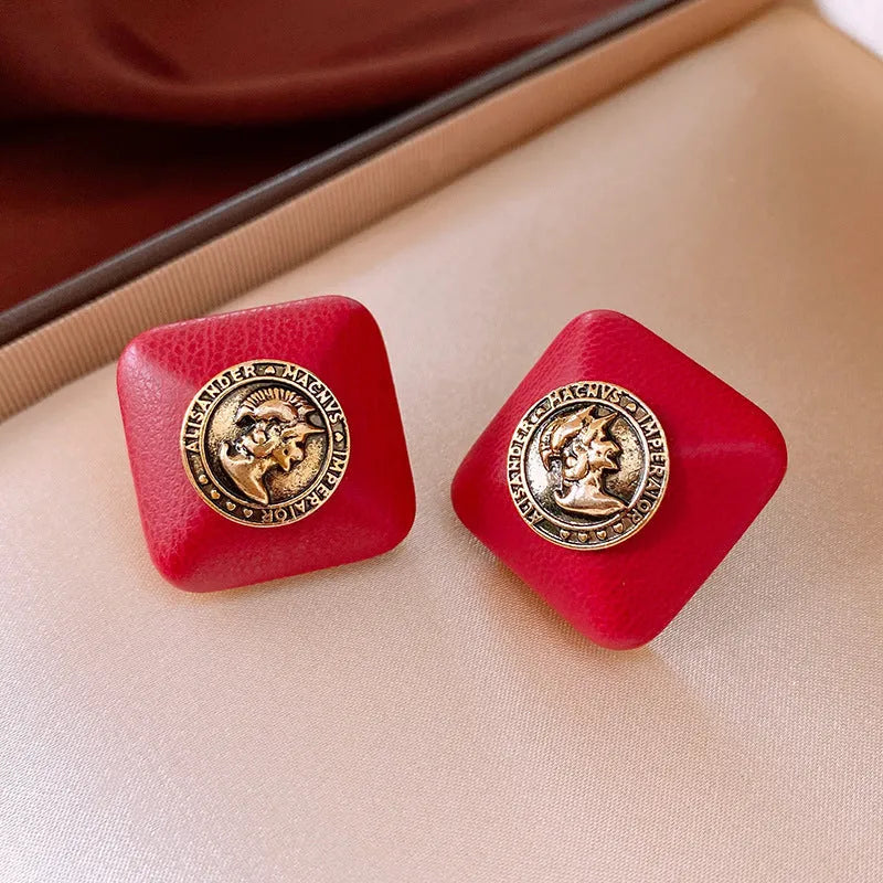 Red diamond-shaped faux leather portrait earrings with silver needle and electroplated alloy, geometric quadrilateral design for women