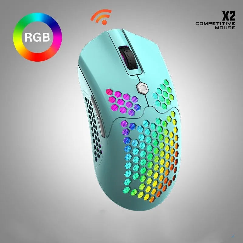 Free Wolf X2 wireless gaming mouse in black on a mouse mat, showing RGB lighting and side thumb buttons.