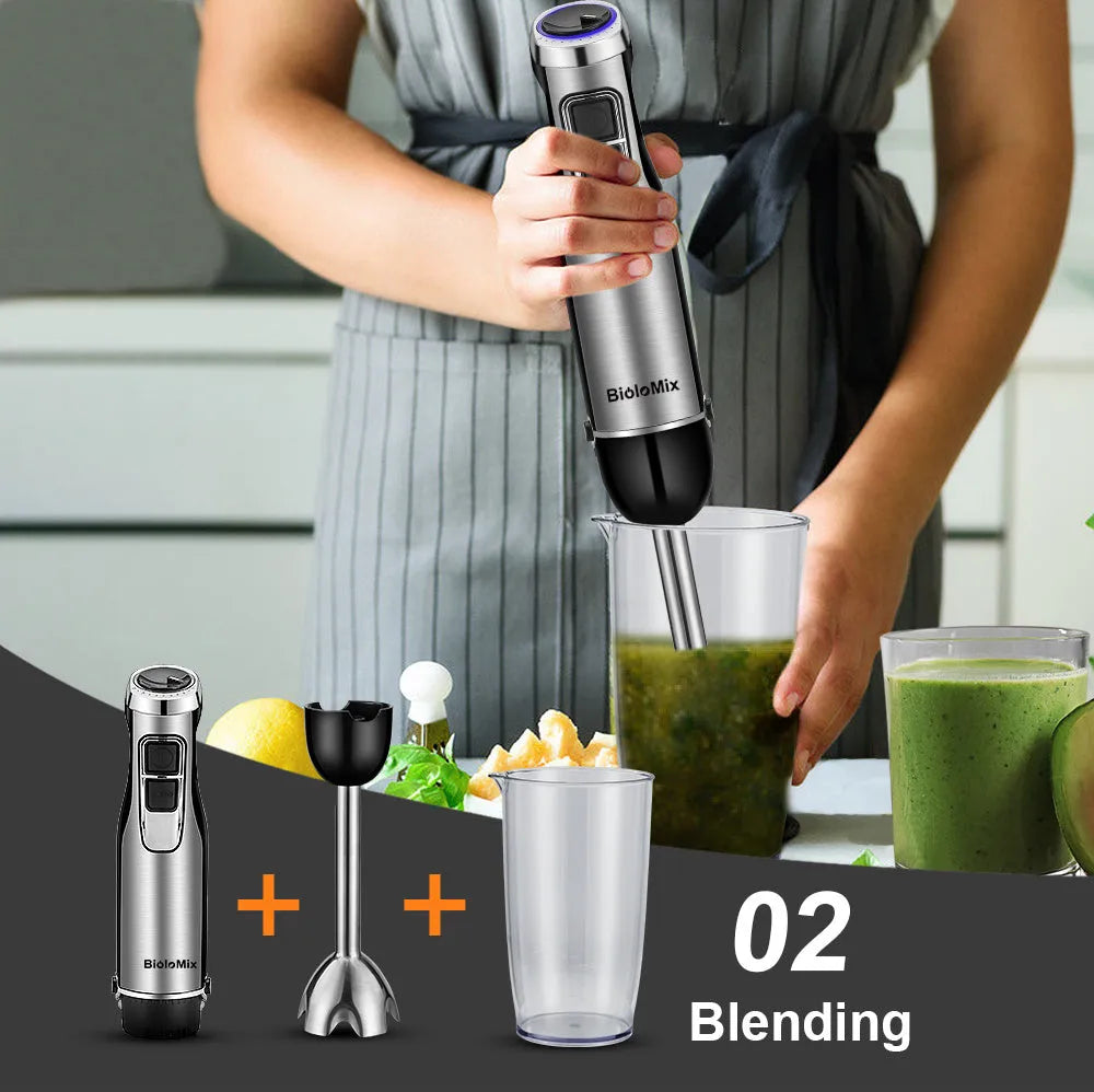 Silver Biolomix hand blender set with stainless steel attachments, chopper bowl, and blending beaker on a kitchen counter