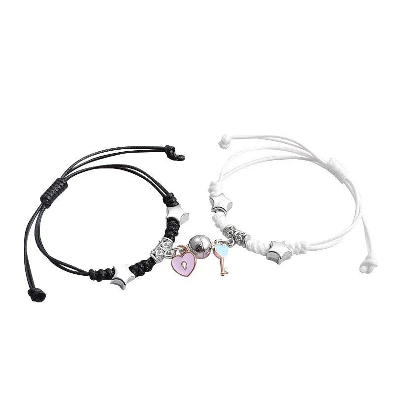 Magnetic couple bracelet pair in alloy with electroplated finish showing I love you design and crown style options