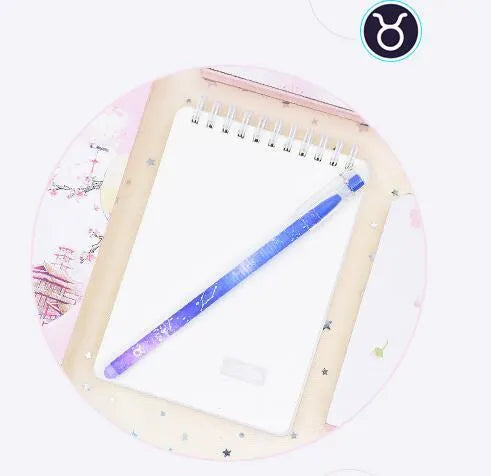 Box of 12 constellation-themed quick-drying gel pens with plastic bodies and coloured caps