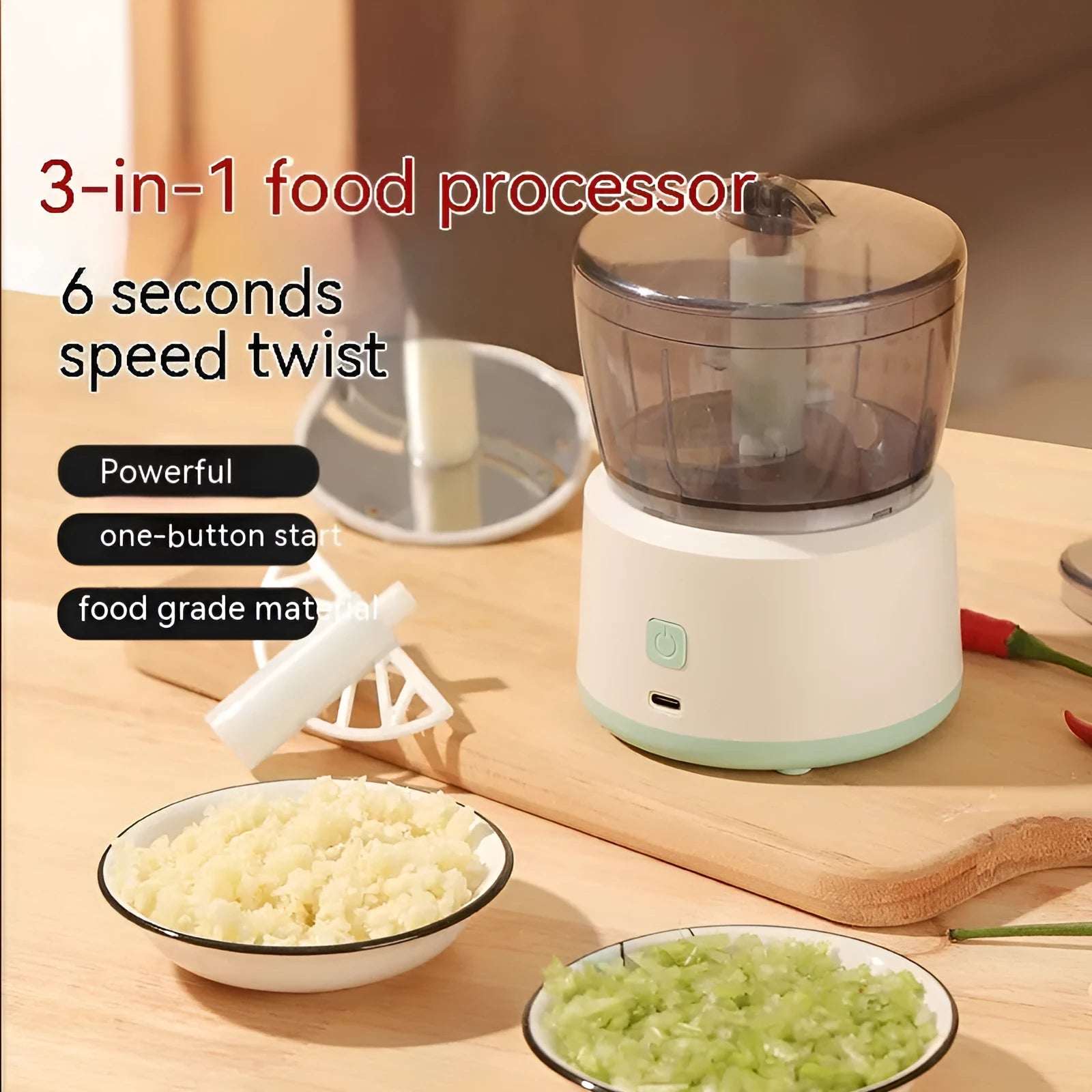 White mini electric meat grinder with transparent cup on kitchen countertop