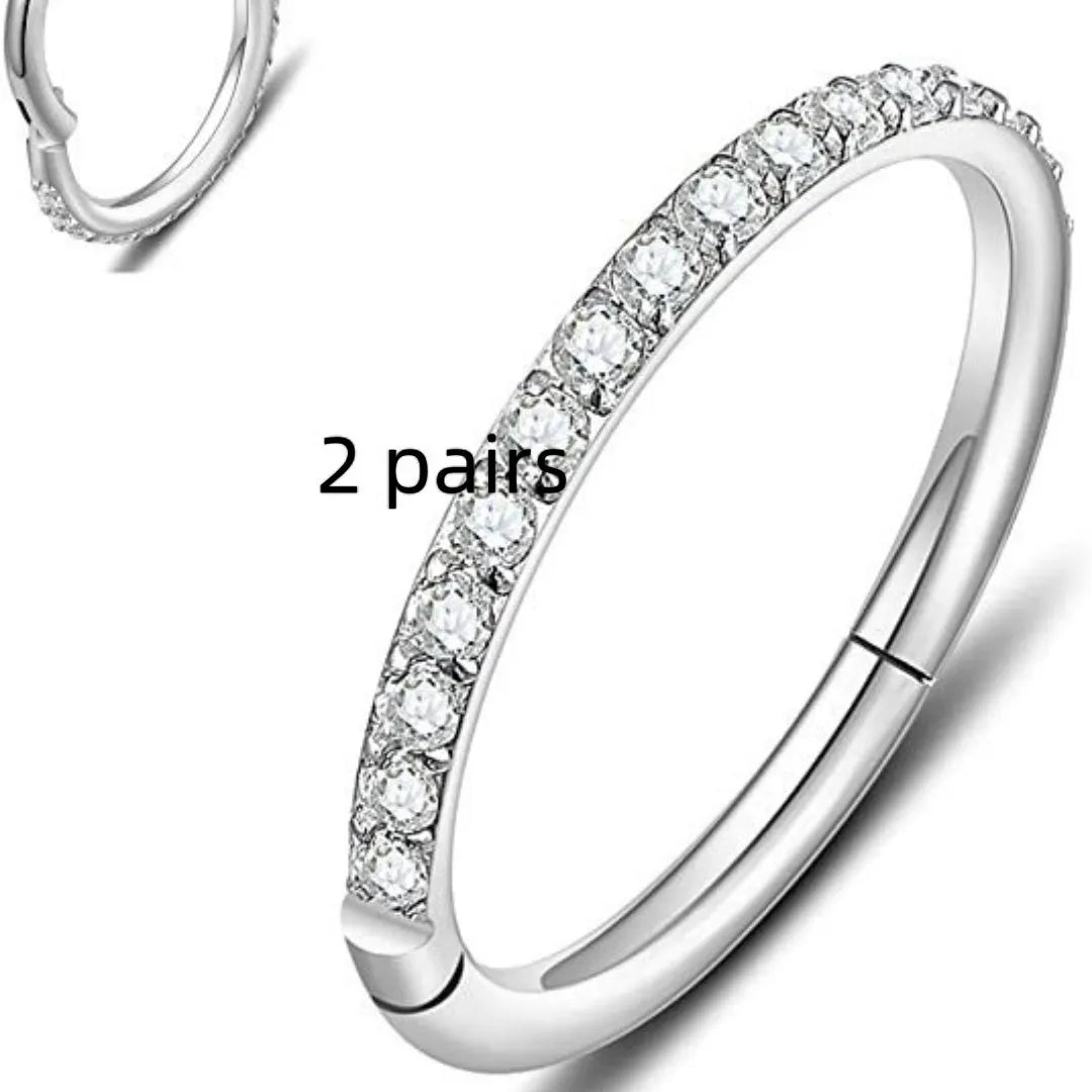 Stainless steel seamless nose ring with diamond detail in gold, rose gold and steel finishes