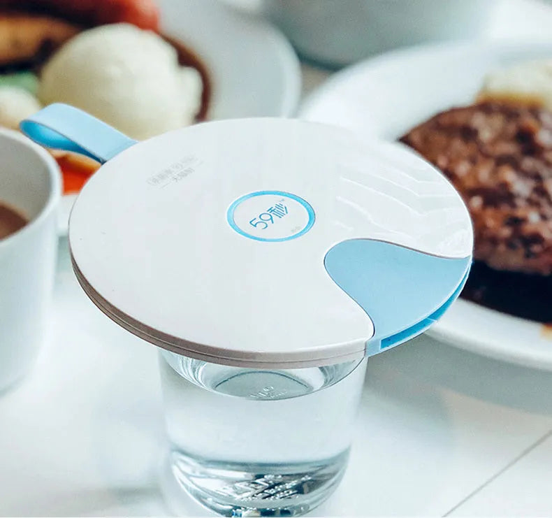 Blue portable UV baby bottle steriliser with USB charging port and compact dimensions