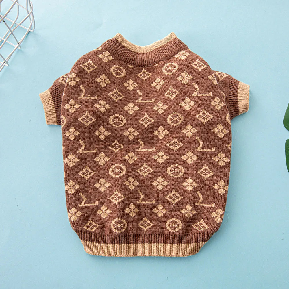 Wool-blend knitted dog sweater in a solid colour on a model dog.