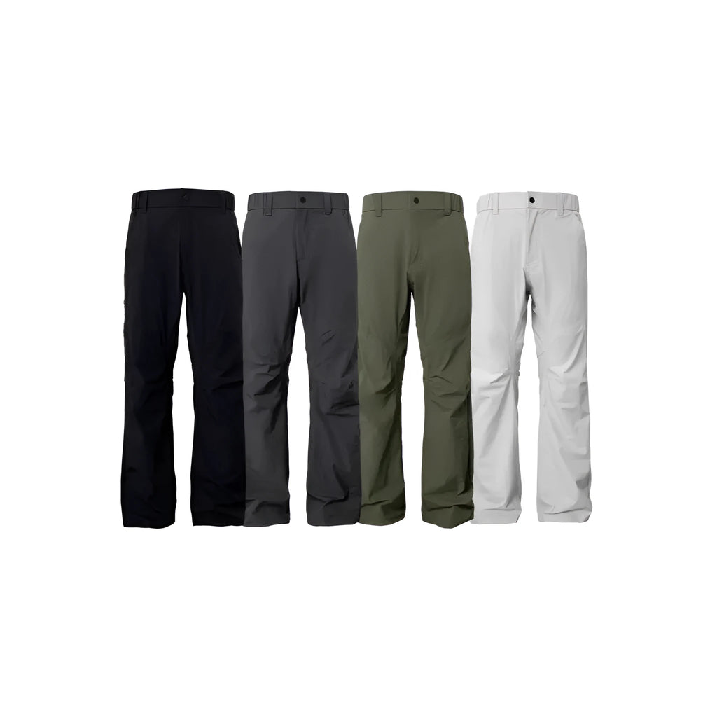 Man wearing grey 3D cut deconstructed casual trousers with a straight leg and elasticated waist.