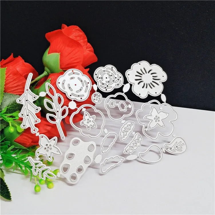 Silver carbon steel flower cutting die with plant etching pattern measuring 14.3 by 9.9 cm