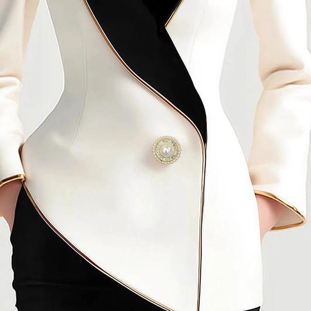 Women's milky white long sleeve coat with golden pearl buttons in irregular design