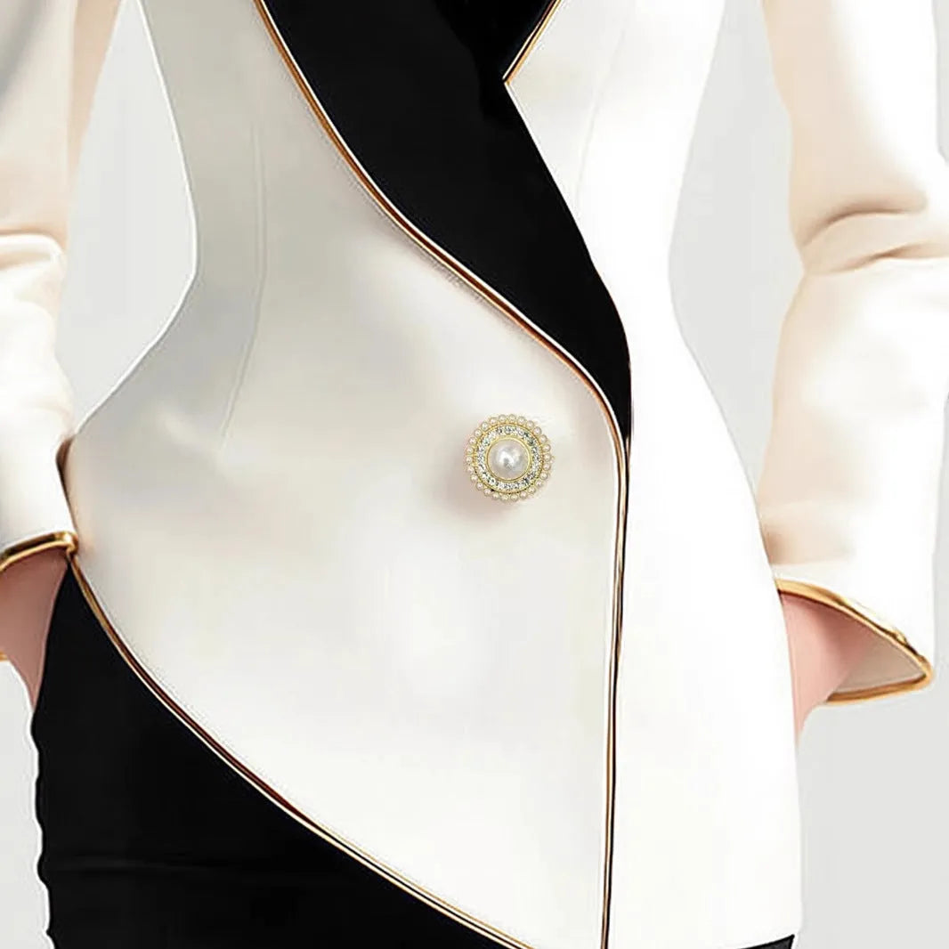 Women's milky white long sleeve coat with golden pearl buttons in irregular design