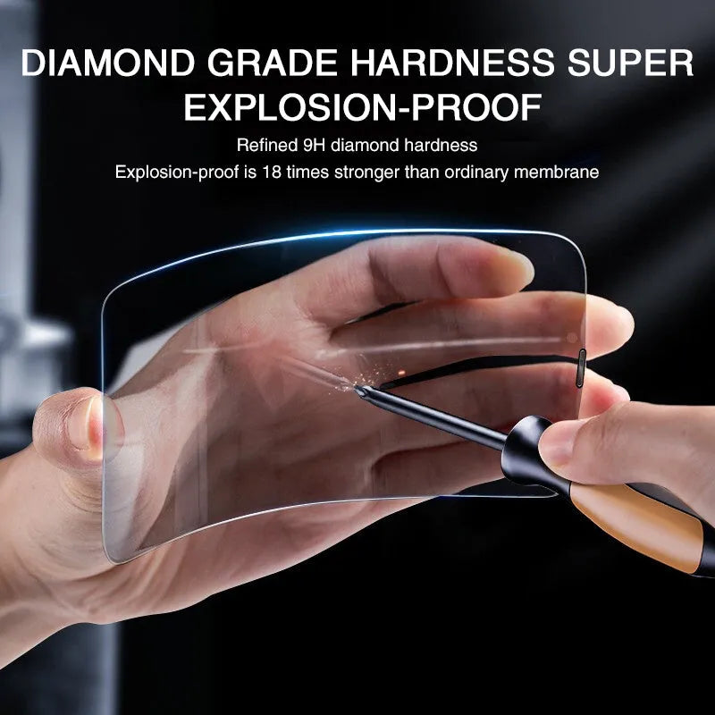 Anti-peeping tempered glass screen protector for iPhone on a table next to a mobile phone.