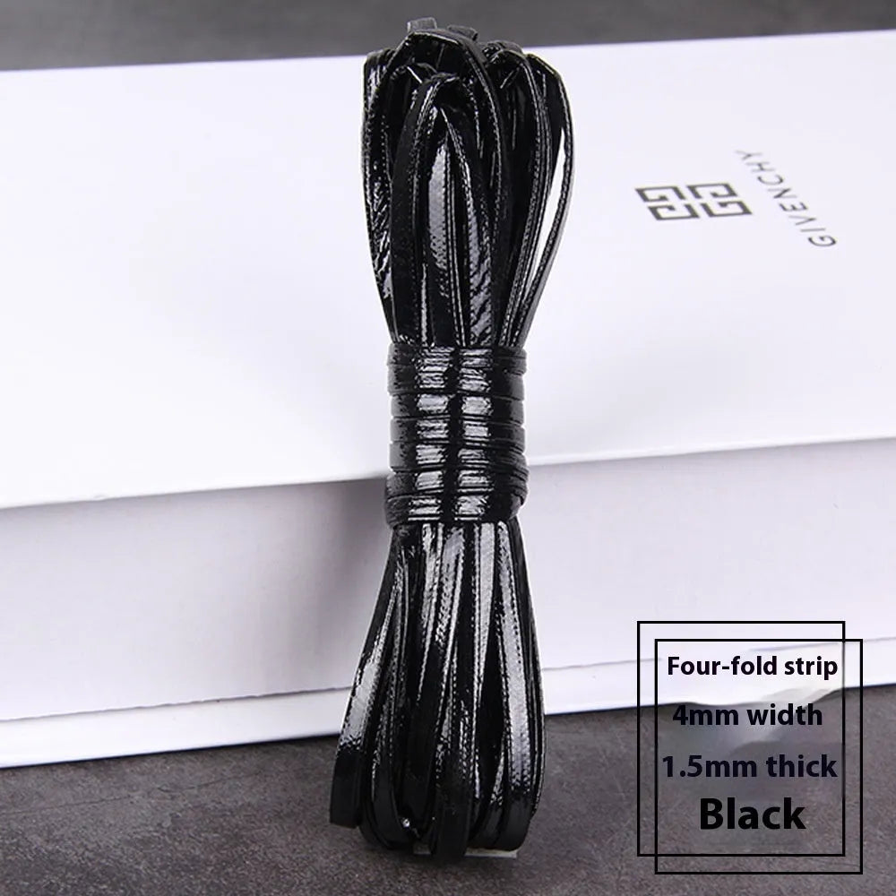 Coils of woven PU leather craft cord in various colours including black, brown, blue, red, and gold.