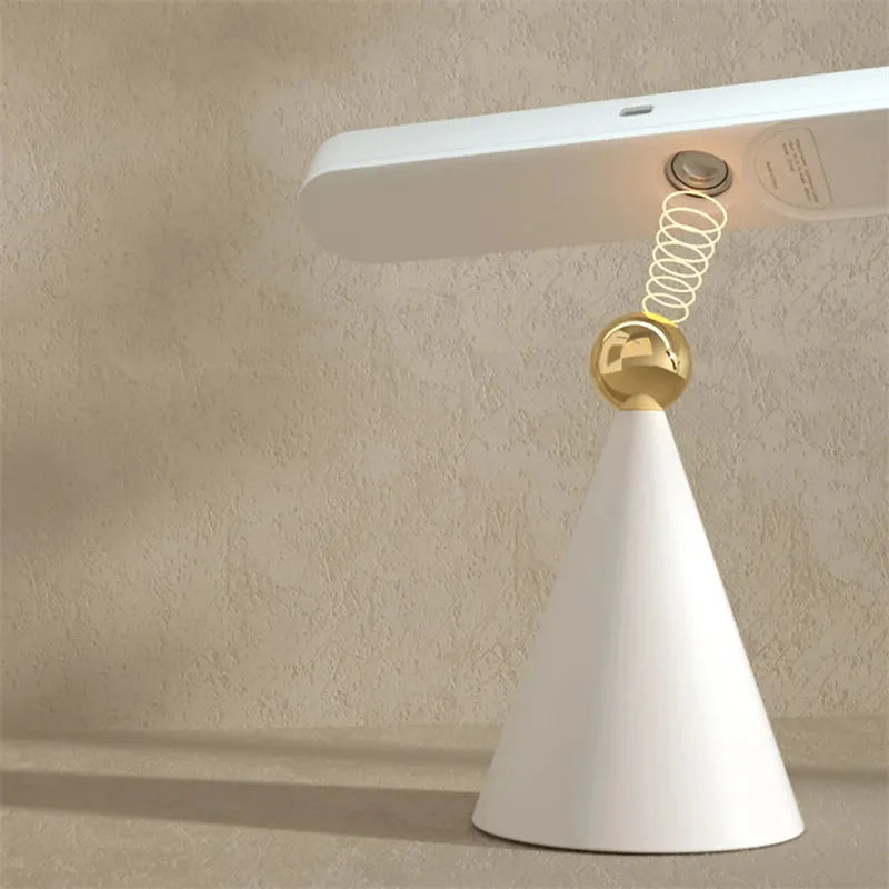 Creative geometric desk lamp in white with magnetic suction base and touch switch, USB powered
