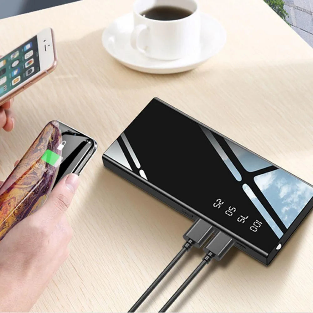 Black 20000mAh portable power bank with LCD screen and two USB ports