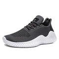 Breathable mesh casual sports shoes for men in black with front tie lacing and high top design