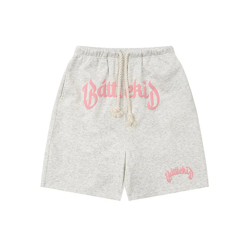 Loose fit black cotton blended hip hop shorts with cropped sweatpants design on a mannequin