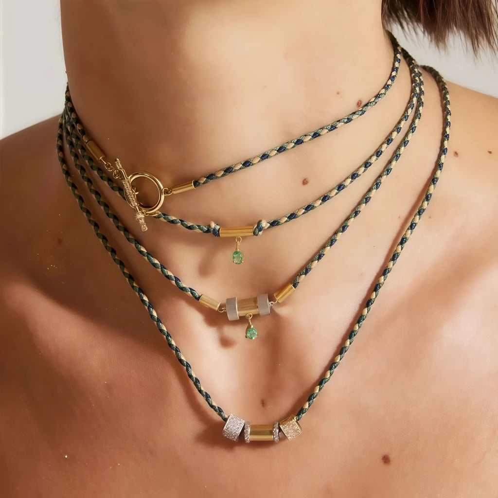 Gold plated copper twin necklace with braid rope chain and emerald-coloured geometric ellipse pendant for women