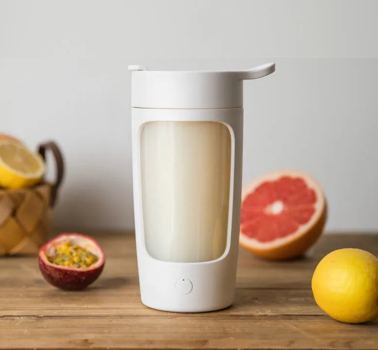 Portable battery-powered juice blender with 650ml mixing cup in black, blue, pink, or white colour.