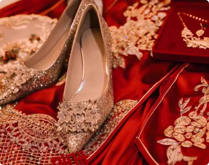 Champagne coloured pointed toe bridal shoes with rhinestone flower pattern and fine heel.