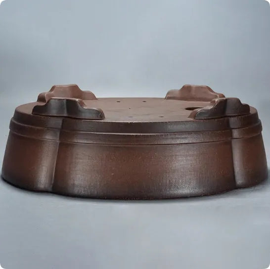 Large classic purple clay flower pot for plants or bonsai, shown from the side.