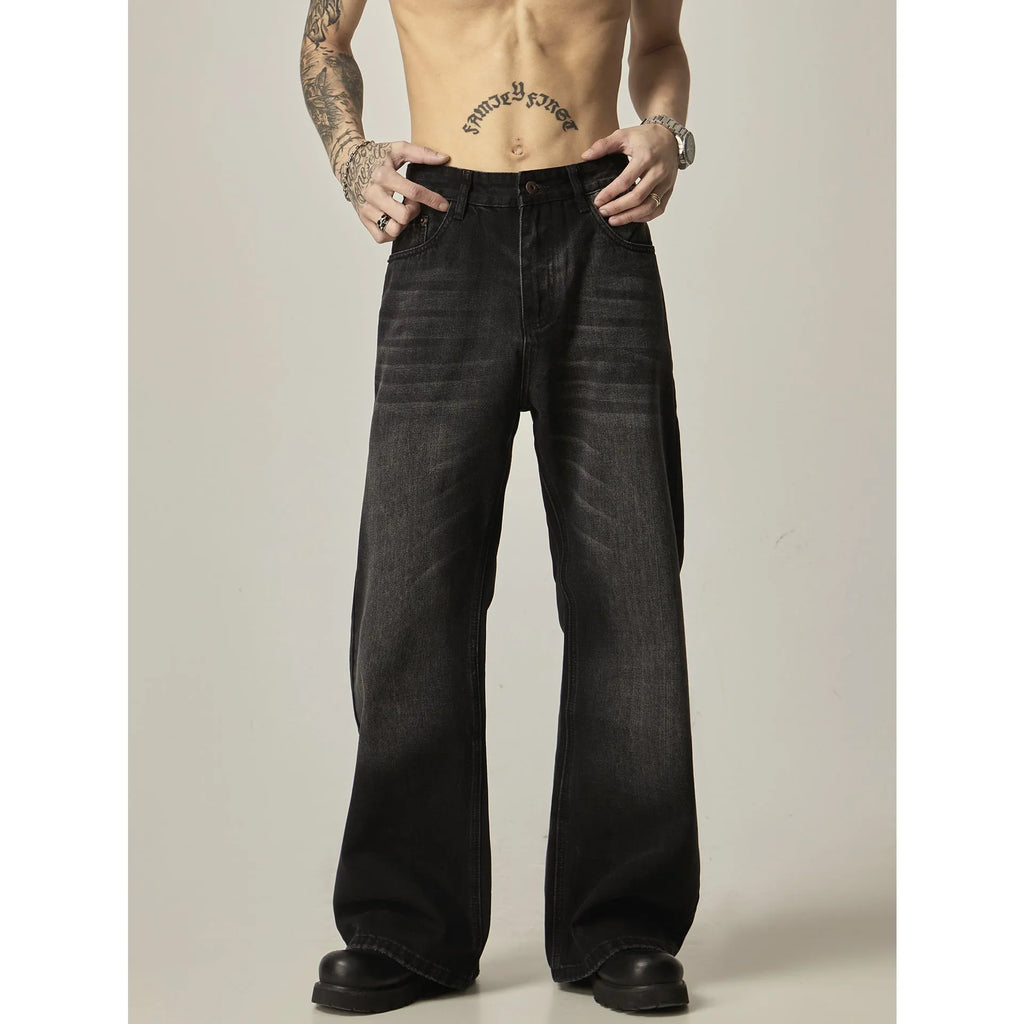 Man's black loose-fit straight-leg retro jeans made from polyester denim fabric.