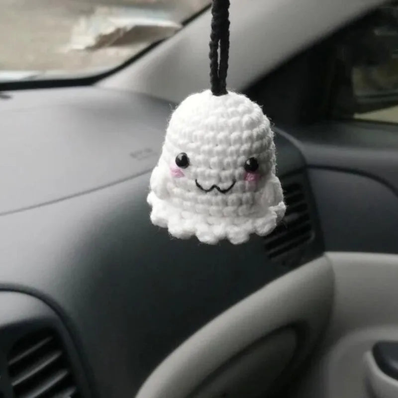 Plush hand-woven car hanging ornament in a cartoon design, made from soft polyester fabric.