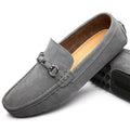 Men's black matte cowhide slip-on shoe with square toe and visible stitching on a plain background.