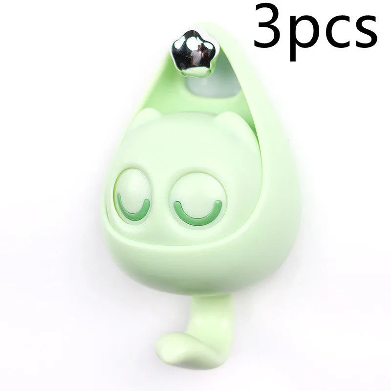 Cream white cat-shaped adhesive wall hook with winking eyes, 2.5kg capacity, 105x61x45mm