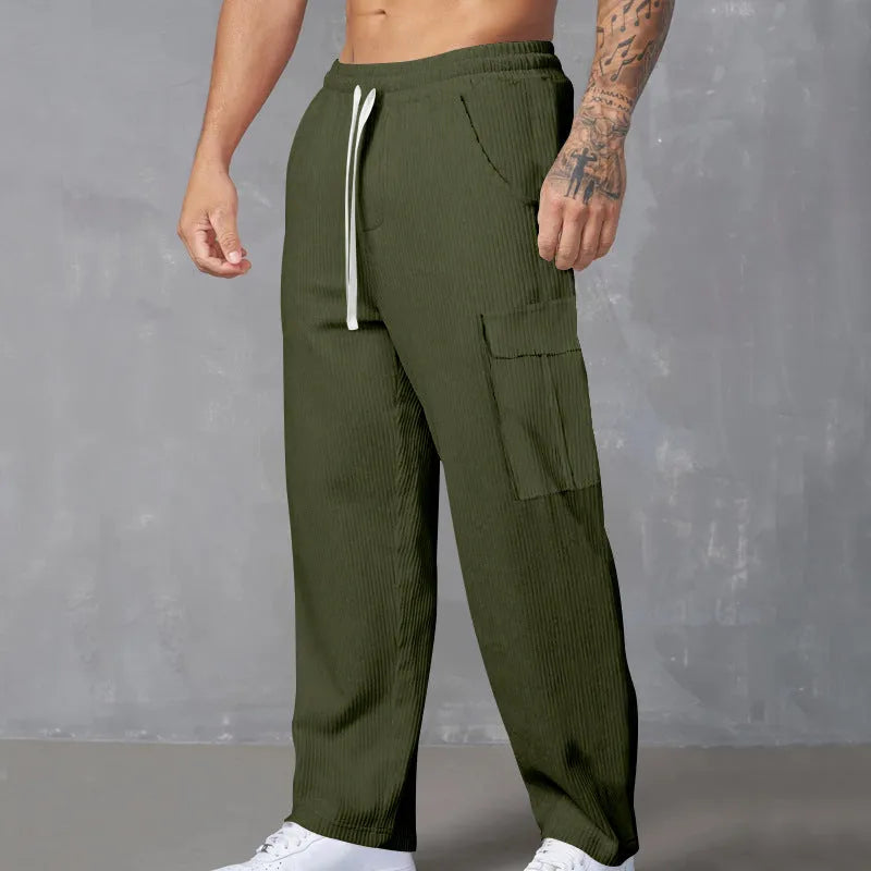Men's straight-leg corduroy cargo trousers in a loose wide-leg fit with a drawstring waist.