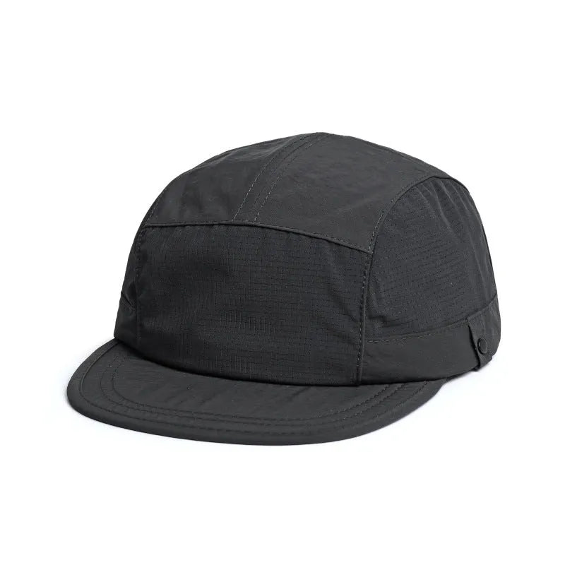 Breathable dome crown sun cap with a soft front tongue in Army Green colour on a wooden background.