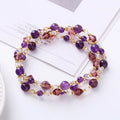 Women's adjustable three-ring crystal bracelet in tourmaline, strawberry quartz, or amethyst on cord.