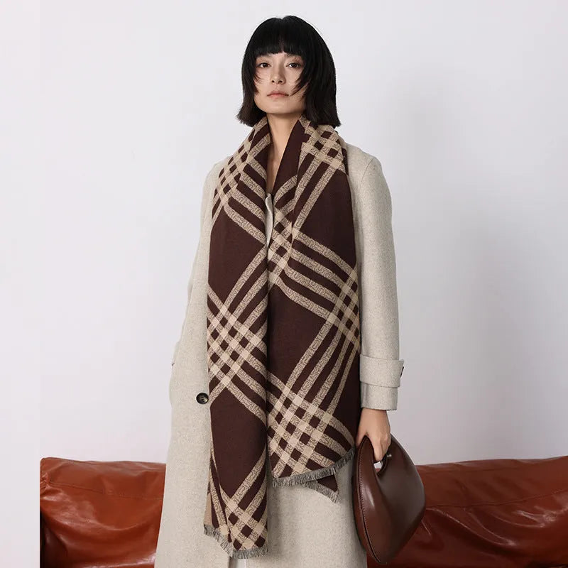 Mid-length brown imitation cashmere winter scarf with tassel trim laid flat.