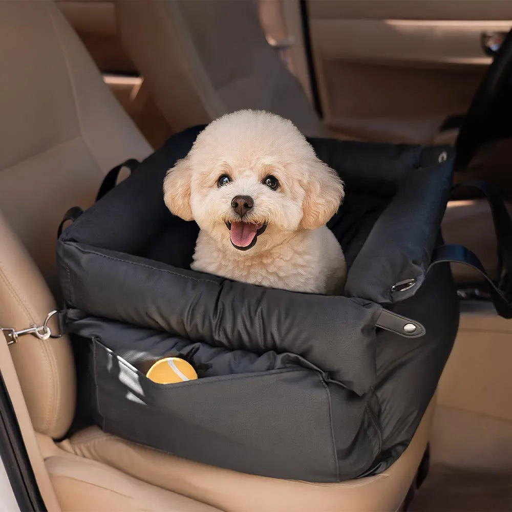 Green waterproof dog car nest bed with sides, showing removable design for washing, placed in a car boot.