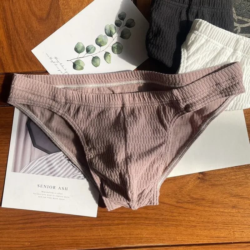 Men's solid colour cotton triangle underwear briefs showing mid waist design and available colour options