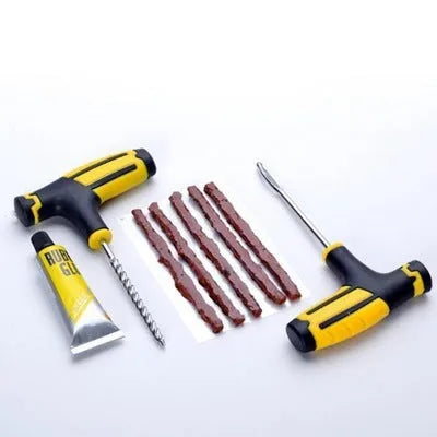 Vacuum tyre repair tool kit with probe, insertion fork, rubber strips and glue for puncture repair