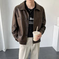 Men's short PU leather jacket with retro lapels, ruffle detailing, and side seam pockets in brown colour