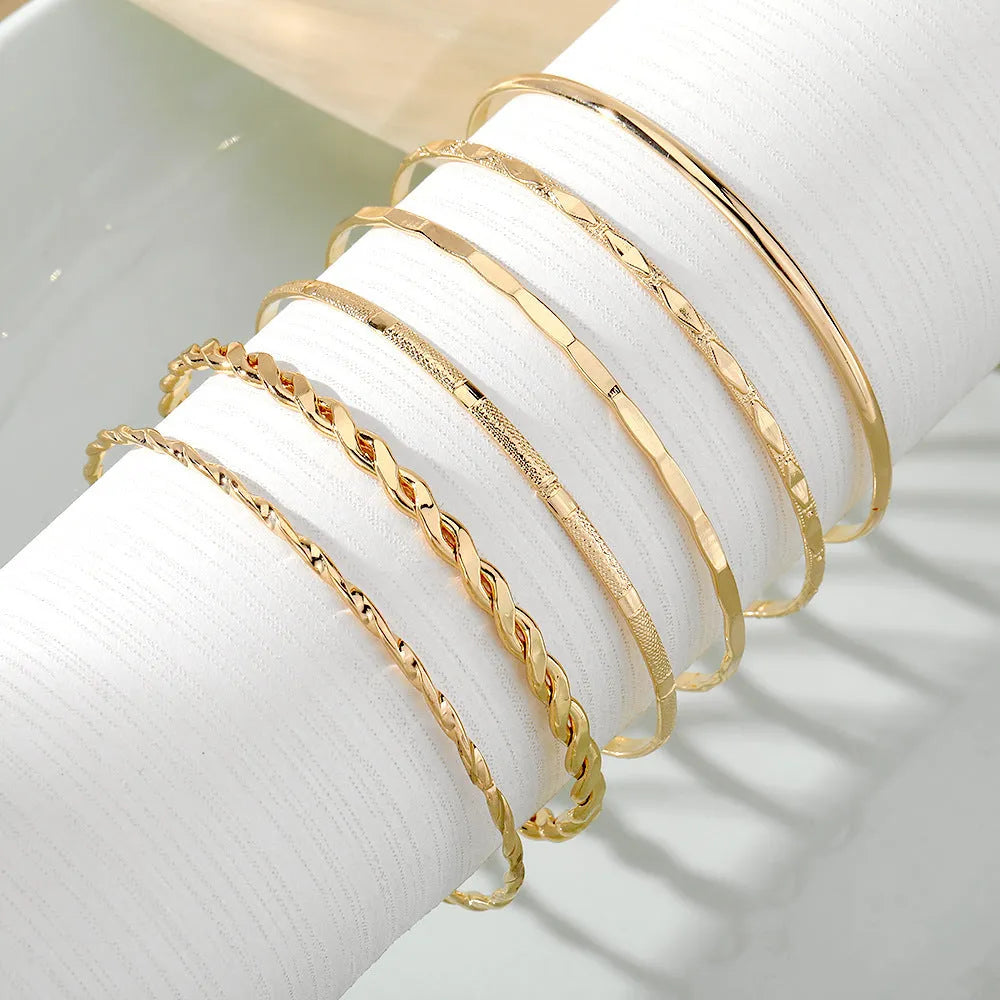 Gold tone bohemian metal chain bracelet set for women with geometric links and musical note bangles