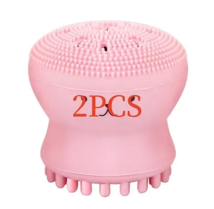 Cartoon octopus silicone wash brush in pink for manual facial cleansing and massage