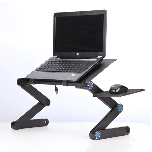Black folding laptop table stand with six legs, magnesium alloy desktop, and attached mouse pad, folded view on a desk