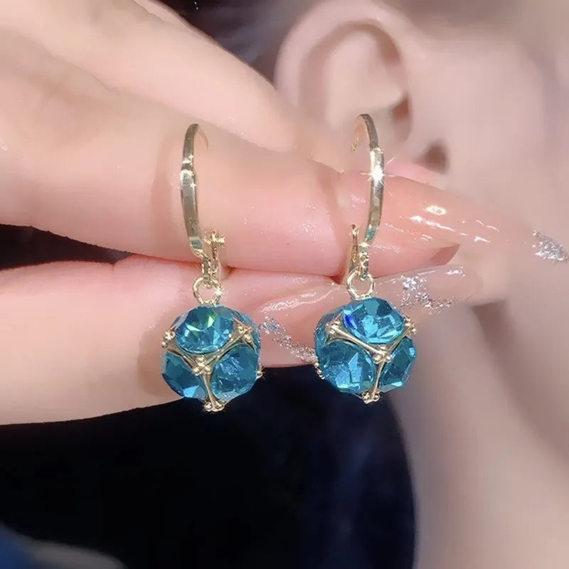 Geometric copper zircon earrings with rose design element in electroplated finish
