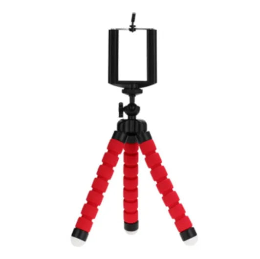 Black flexible octopus tripod with wrapped legs holding a smartphone next to a camera.