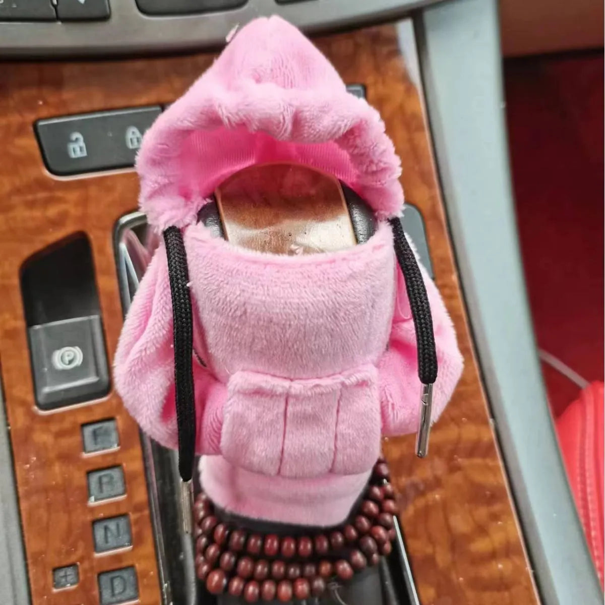 Dutch velvet car gear handle sleeve and handbrake cover in various colours on a car interior.