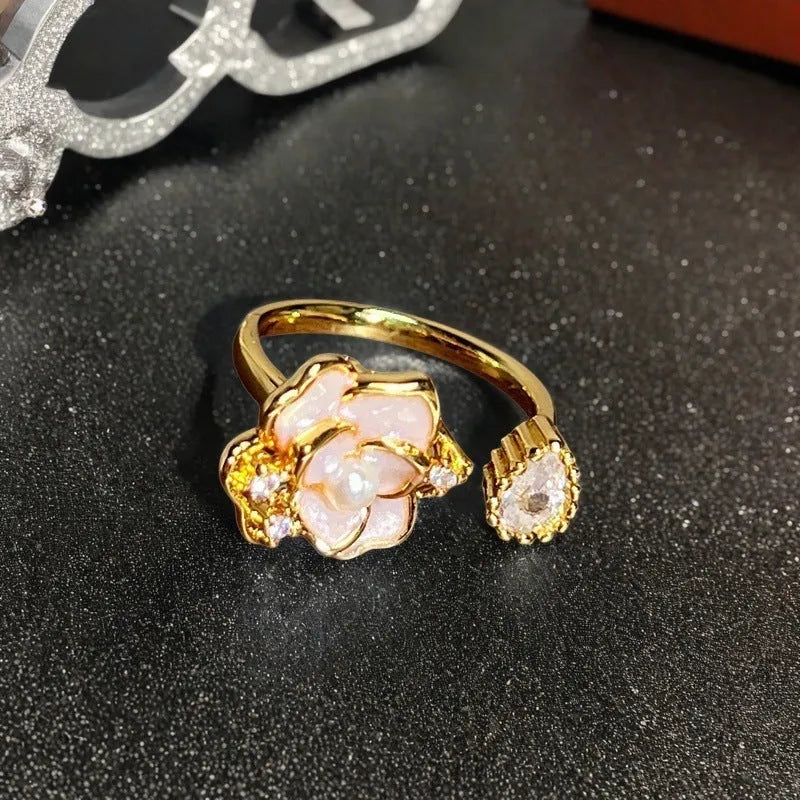 Adjustable copper ring with vintage gourd, floral, and bow design in New Chinese style, set with zircon stones.
