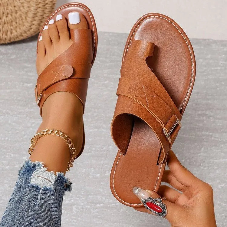 Women's flat heel leisure slippers in solid colour artificial PU with metal and leather stitching, sizes 36-43
